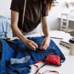 Woman upcycling old clothes in Ireland. sustainablefashion.ie
